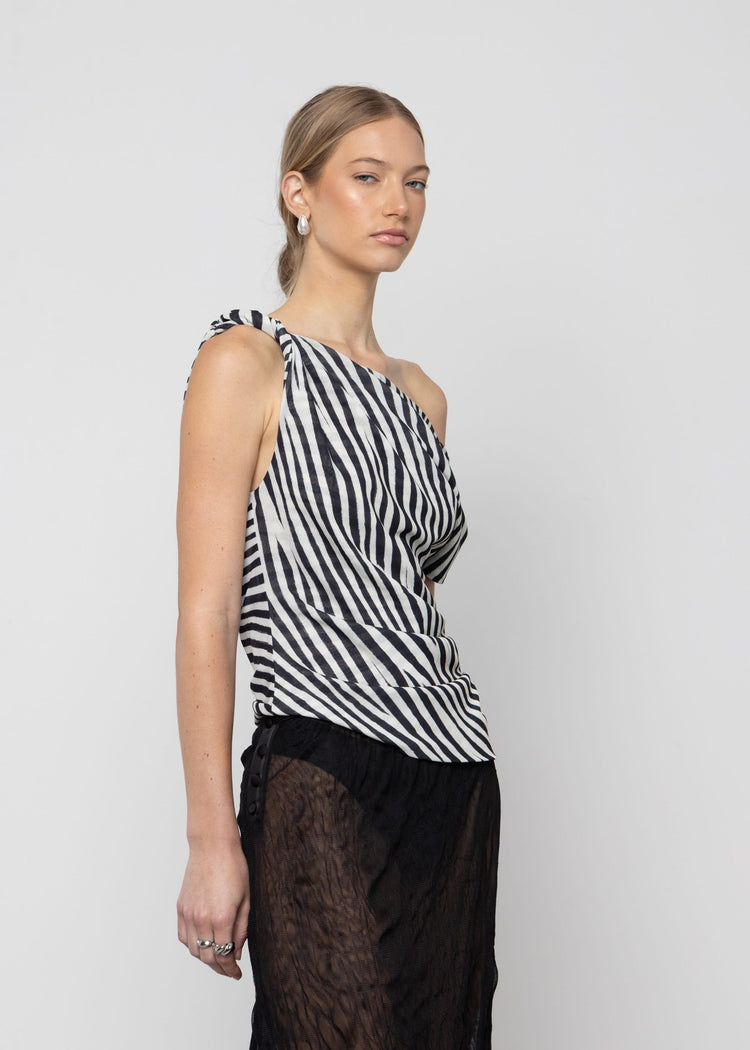 ASYMMETRIC TWIST TOP